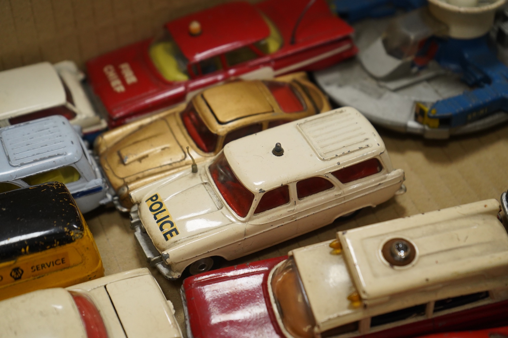A collection of forty Corgi Toys and fourteen Matchbox Series diecast vehicles, including; The Man From Uncle Oldsmobile, a James Bond Aston Martin DB5 in gold, a Commer 5-ton truck with trailer and a selection of loads,